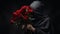 Dramatic Photograph Of Woman With Dark Hood And Red Roses
