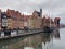 Dramatic picture of the historical buildings of Gdansk on the cold channel