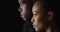 Dramatic profile rack focus of two young black people