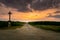 Dramatic purple sunset in the countryside farmland of sunflowers