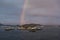 Dramatic rainbow of the arctic coast of Norway