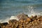 Dramatic rocks on a coastline with aegent sea.