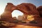 dramatic sandstone arch illuminated by golden sunlight