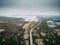 Dramatic scene, road Murmansk region through tundra, direction to Teriberka. Aerial top view