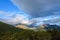 Dramatic scenic view, cloudy sky and early evening sun highlighting mountain peaks, Cerro Alarken Nature Reserve, Ushuaia, Argenti