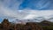 Dramatic shot of volcanic Mount Teide in Tenerife with mist shrouded peaks