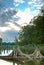 Dramatic skies over stump filled lake