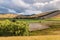 Dramatic sky above Wither Hills and Taylor dam lake near Blenheim, New Zealand