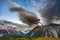 Dramatic sky and clouds with green grass in in Mount Cook National Park