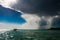 Dramatic sky with cumulonimbus clouds over turquoise South Pacific Ocean, Bora Bora