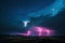 dramatic sky with electric blue flares and pink aurora