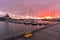 Dramatic sky over a harbour at sunset