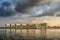 Dramatic sky over modern waterfront development