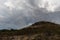 Dramatic sky and rainbow in Tucson, Arizona, near Mission San Xavier del Bac