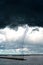 Dramatic sky with stormy clouds. The combination of light and dark clouds. Lightning strikes the ground