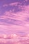 Dramatic soft sunrise, sunset pink violet sky with clouds background