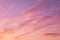 Dramatic soft sunrise, sunset pink violet sky with clouds background texture