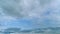 Dramatic spring cloudscape. Blue sky white clouds. Changing cloudscape. Time lapse.