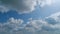 Dramatic spring cloudscape. Blue sky white clouds. Changing cloudscape. Time lapse.