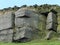 Dramatic stone outcrop in yorkshire moors with craggy sandstone