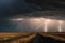 Dramatic storm cloud formation and bolts of lightning, illustrating the growing intensity of storms and extreme weather events