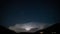 Dramatic storm and lightning over alpine valley in dark summer evening