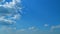 Dramatic Summer cloudscape. Blue sky white clouds. Changing cloudscape. Time lapse.