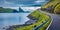 Dramatic summer scene of Faroe Islands and Tindholmur cliffs on background. Panoramic morning view of Vagar island, Denmark, Europ