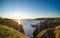 Dramatic sunrise cliffs at Cable John Cove Newfoundland. Daybreak over Atlantic ocean