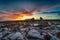 Dramatic sunrise over modern standing stones at Deirbhile\\\'s Twist