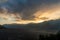 Dramatic sunset as last light pass through the mountain range in Bromo Tengger Semeru National Park,  East Java, Indonesia