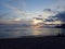 Dramatic Sunset behind the clouds and Waianae Mountain range