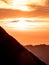 dramatic sunset behind mountain range, mountain silhouette swiss alps brienzer rothorn