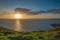 Dramatic sunset on Cornish coast , over Atlantic Ocean