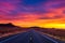 Dramatic sunset over an empty road in Utah