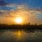 Dramatic sunset over quiet lake