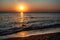 Dramatic sunset over sea and mountain. Photographed in Pirgos Sani on Halkidiki Greece.