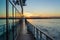 Dramatic sunset reflected in windows of Mississippi river cruise boat