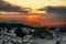 Dramatic Sunset On Volcanic Rock With Snow