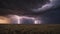 A dramatic thunderstorm over a vast, open prairie with lightning streaking across the