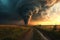 Dramatic tornado forms over rural landscape