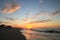 Dramatic Tropical Sunrise over Pacific Ocean and Sandy Beach