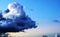 Dramatic unique storm cloud on beautiful blue sky