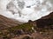 Dramatic view of clouds revealing Toubkal massif near Imlil in High Atlas