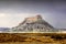 Dramatic view of a sandstone mountain called Factory Butte rock