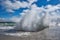 Dramatic view of sea waves crashing against the concrete pier