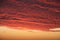 Dramatic Volcanic Crimson Sunset over Pacific Ocean