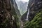 dramatic waterfall along steep mountain trek