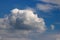 Dramatic white cloud in blue sky on sunny day