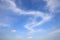 Dramatic white clouds on blue sky